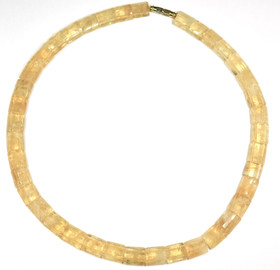 Kaulahelmet sitriini, litteät viistehiotut sitriinit. Juhlava