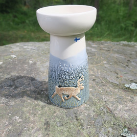 Maljakko ja tuikkualusta kesäporo. Sekunda