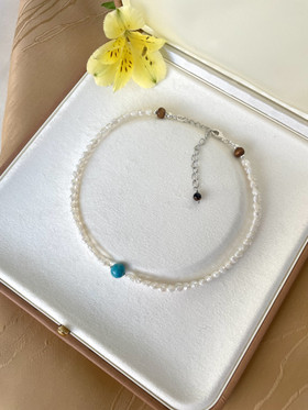 Palade-kaulakoru, jokikivi-makeanvedenhelmi