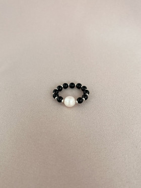 Onyx-sormus, makeanvedenhelmi