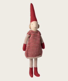 Magneettityttö raitamekossa