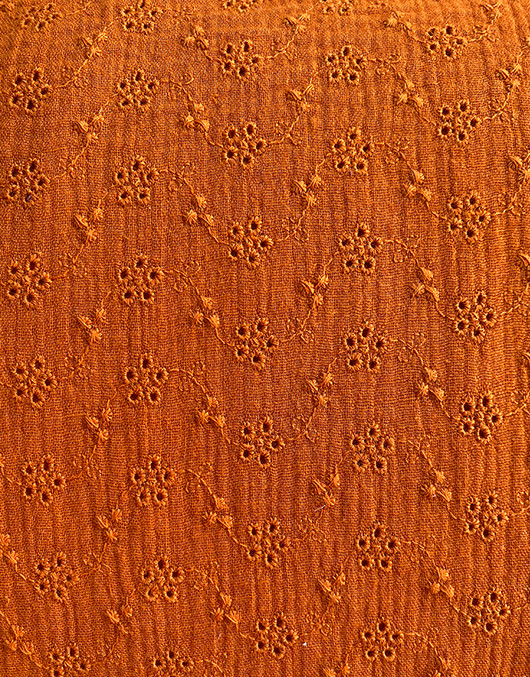 Puuvillamusliini kirjailtu oranssi