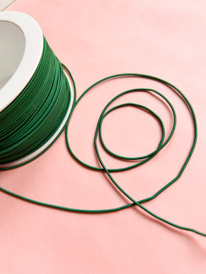 Kuminauha 1 mm pullonvihreä