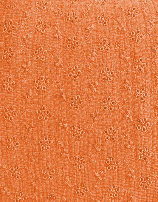 Puuvillamusliini kirjailtu vaalea porkkana