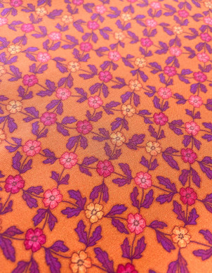 Pikkuruinen Kuisti-puuvillakangas oranssi