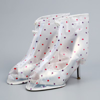 Kevyt sadesuoja kenkiin