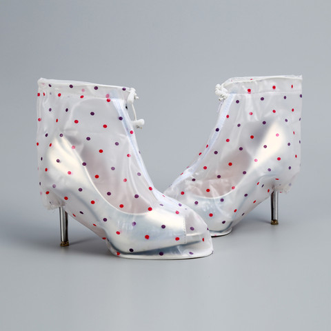 Kevyt sadesuoja kenkiin