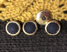 Kultareunainen kantanappi