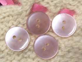 Vaaleanpunainen perusnappi