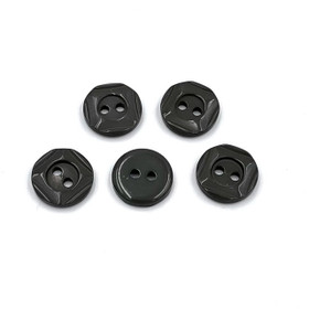 Harmaanvihreä muovinappi