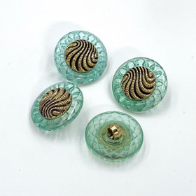 Vihreä kultakuvioinen kantanappi