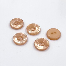 Persikka helmiäis muovinappi 