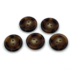 Ruskea kirjava nappi 