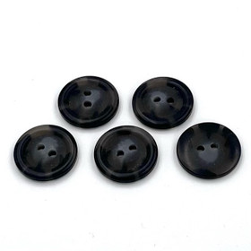 Ruskean musta kirjava nappi 