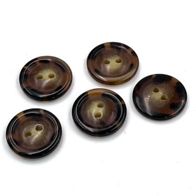 Ruskea kirjava nappi 