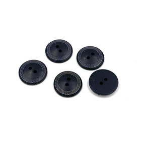 Musta kuvioitu nappi 