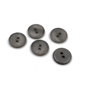 Vihreänharmaa nappi 