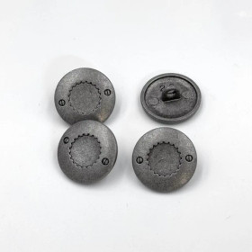 Rataskuvioinen kantanappi 