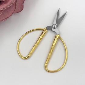 Golden scissors
