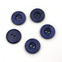 Dark blue pearly button with grooves