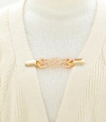 Huivikoru, huiviklipsi, ponchoklipsi, neuleklipsi 