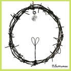 Valoa kohti - piikkilankakranssi