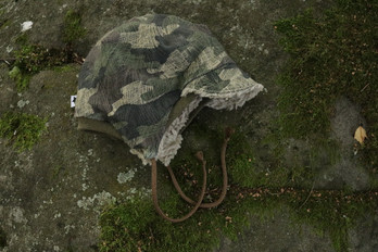 Lippahattu pörrövuorilla, 46