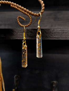 Korvakorut, Kultamonoliitti