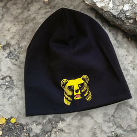 Mustapipo keltaisella karhukuviolla