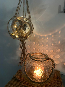 Lasimalja köydellä