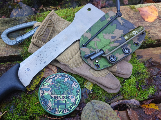 Varusteleka Partiokirves Teräsuoja M05 Camo Survival Edt. 
