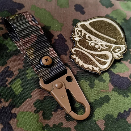 Avain/Varusteklipsi M05 Camo 