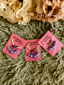 Violetti Kukka- silmukkamerkki