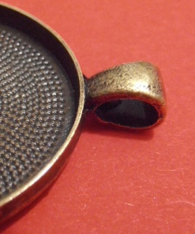 Ramberlock, 40x30mm, oval, färg brons