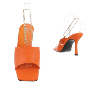 Korkokengät kultaisella nilkkaketjulla