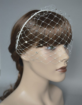 Birdcage huntu strasseilla pannassa, ivory