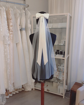 Rusettihuntu satiini rusetilla, vaalea ivory