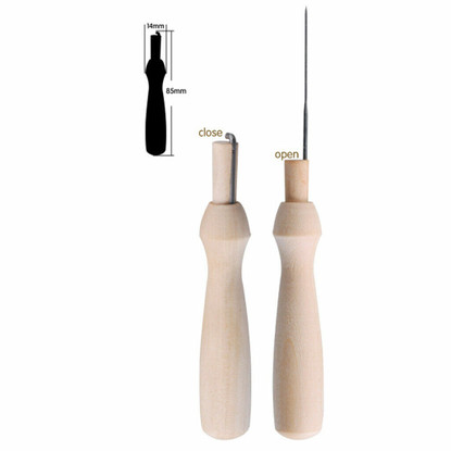 Puinen neulanpidike ja yksi huovutusneula