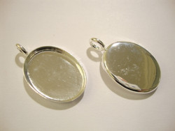 Korukehys / riipus hopeoitu ovaali 26 x 19 mm