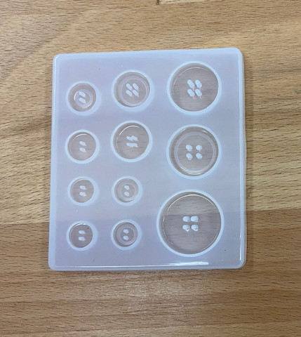 Silikonimuotti napit koruhartsille