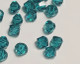 Swarovski kristallihelmi bicone turkoosi 6 mm (5 kpl)