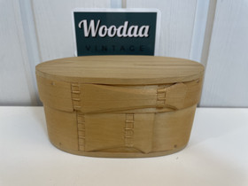 V102 a small wooden vessel