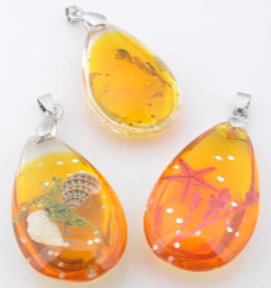 Korunosa Pinkki/oranssi riipus meriaihe