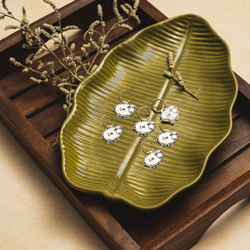 Silmukkamerkit, Lantern Moon