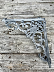 Metallinen, rouhea hyllynpidike