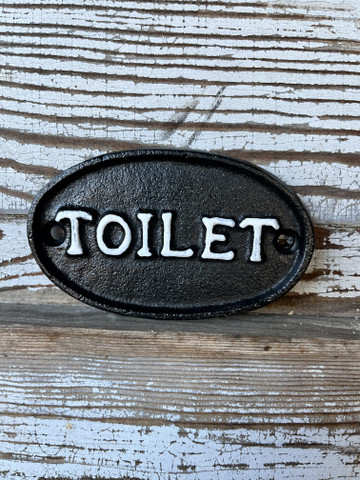 Soikea toilet kyltti valurautaa, väri musta
