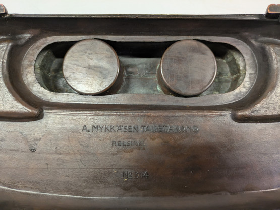 Mustepulloteline Mykkänen taidetakomo Nro 314