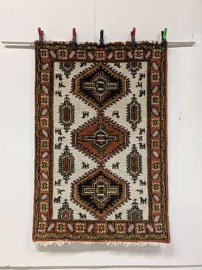 Käsinsolmittu matto 