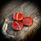 Punainen jaspis kämmenkivi