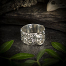 Topaasi-sormus, Curly, hopea